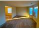 Sunlit living room with neutral carpet and a large window at 4547 Carriage Park Dr, Lithonia, GA 30038