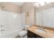 Clean bathroom with granite countertop and shower/tub combo at 5269 Heron Bay Blvd, Locust Grove, GA 30248