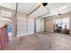 Spacious two-car garage with ample space for parking and storage at 5269 Heron Bay Blvd, Locust Grove, GA 30248