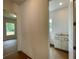 Bathroom view featuring a vanity and mirror plus partial views of an adjacent room at 679 Crest Line Trl, Powder Springs, GA 30127
