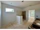 Bathroom area featuring a modern open shower layout and natural light streaming through the window at 679 Crest Line Trl, Powder Springs, GA 30127