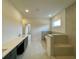 Large bathroom showcasing a double vanity and separate area for a bathtub and shower at 679 Crest Line Trl, Powder Springs, GA 30127
