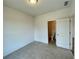 Unfurnished bedroom featuring neutral walls and carpet, awaiting your personal touch at 679 Crest Line Trl, Powder Springs, GA 30127