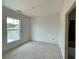 Bedroom featuring a big window with a view to the outside at 679 Crest Line Trl, Powder Springs, GA 30127