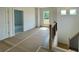 Bright hallway features natural light and leads to other rooms, enhancing the sense of space at 679 Crest Line Trl, Powder Springs, GA 30127