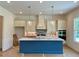 New kitchen featuring a large center island, modern appliances, and custom backsplash at 679 Crest Line Trl, Powder Springs, GA 30127