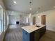 Open concept kitchen with stainless steel dishwasher, center island, and recessed lighting at 679 Crest Line Trl, Powder Springs, GA 30127