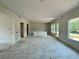 Large living room with lots of natural light with a door to the back at 679 Crest Line Trl, Powder Springs, GA 30127