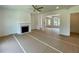 Bright living room featuring a classic fireplace and an open layout, perfect for modern living at 679 Crest Line Trl, Powder Springs, GA 30127