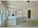 Spacious living room with a fireplace, large windows for natural light, and open layout at 679 Crest Line Trl, Powder Springs, GA 30127