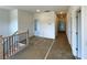 Upstairs hallway is bright and airy with lots of doors and natural light at 679 Crest Line Trl, Powder Springs, GA 30127