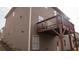 Exterior view of home's deck and brown siding at 1320 Newbridge Cir, Buford, GA 30519