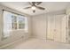 Spacious bedroom with neutral walls, ceiling fan and closet at 1519 Carnaby Ct, Dunwoody, GA 30338