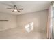 A large bedroom with a ceiling fan and a window at 1519 Carnaby Ct, Dunwoody, GA 30338