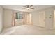 Bedroom with ceiling fan and window providing natural light at 1519 Carnaby Ct, Dunwoody, GA 30338