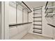 Walk-in closet featuring wire shelving, providing ample storage solutions and organization at 1519 Carnaby Ct, Dunwoody, GA 30338