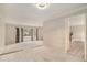 Dining room with carpeting, a view of the living room and access to the kitchen at 1519 Carnaby Ct, Dunwoody, GA 30338