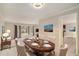 Elegant dining room with a decorative chandelier, and a table set for a dinner party at 1519 Carnaby Ct, Dunwoody, GA 30338