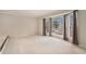 Bright living room with bay windows and neutral carpeting at 1519 Carnaby Ct, Dunwoody, GA 30338