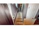 Carpeted staircase leading to the upper floor of the home at 5789 Star Flower Dr, Ellenwood, GA 30294