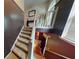 Carpeted staircase leading to the second floor at 5789 Star Flower Dr, Ellenwood, GA 30294