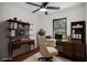 Home office with built-in shelving and hardwood floors at 942 Azalea Cir, Marietta, GA 30062