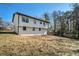 Two-story house with white siding and a backyard at 942 Azalea Cir, Marietta, GA 30062