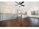 Open concept living room with kitchen and hardwood floors at 942 Azalea Cir, Marietta, GA 30062