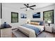 Main bedroom with a king bed and ceiling fan at 942 Azalea Cir, Marietta, GA 30062