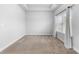 Bright and airy bedroom with neutral carpeting and large window at 1208 Stone Castle Cir # 3, Smyrna, GA 30080