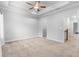 Bright bedroom with carpeted floor and walk-in closet at 1208 Stone Castle Cir # 3, Smyrna, GA 30080