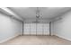 Spacious garage with overhead storage and ample room for parking at 1208 Stone Castle Cir # 3, Smyrna, GA 30080