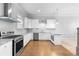 Modern kitchen with stainless steel appliances and granite counters at 1208 Stone Castle Cir # 3, Smyrna, GA 30080