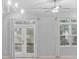 Living room with French doors leading to balcony at 1208 Stone Castle Cir # 3, Smyrna, GA 30080