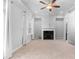 Spacious living room featuring a fireplace and access to a deck at 1208 Stone Castle Cir # 3, Smyrna, GA 30080
