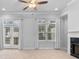 Spacious living room with fireplace and multiple windows at 1208 Stone Castle Cir # 3, Smyrna, GA 30080