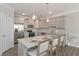 Modern kitchen with gray cabinets and granite countertops at 2871 Fareed St, Douglasville, GA 30135