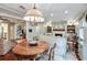 Bright dining area with hardwood floors and view into living room at 1654 Executive Park Ln, Brookhaven, GA 30329