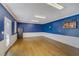 Finished basement with light oak laminate flooring, ready for your personal touches at 202 Heights Pl, Canton, GA 30114