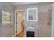 Modern bathroom with a sleek vanity, updated shower, and ample natural light at 202 Heights Pl, Canton, GA 30114