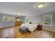 Expansive bedroom with hardwood floors, large windows, and a neutral color palette at 202 Heights Pl, Canton, GA 30114