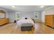 Bright bedroom with hardwood floors, neutral walls, large windows, and well lit at 202 Heights Pl, Canton, GA 30114