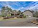 Charming home with covered porch, well-manicured lawn, and two-car garage at 202 Heights Pl, Canton, GA 30114