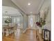 Welcoming foyer with hardwood floors and an open view to the dining room at 202 Heights Pl, Canton, GA 30114
