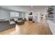 Comfortable living room with brick fireplace, hardwood floors, and neutral decor at 202 Heights Pl, Canton, GA 30114