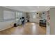 Well-lit home office featuring a whiteboard, desk, and comfortable seating at 202 Heights Pl, Canton, GA 30114