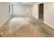 Unfinished basement with concrete flooring at 7045 Treeline Dr, Cumming, GA 30028