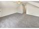 Spacious bedroom with plush carpeting and ceiling fan at 7045 Treeline Dr, Cumming, GA 30028