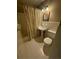 Charming bathroom with pedestal sink, tub, and patterned shower curtain at 4282 Roswell Ne Rd # G2, Atlanta, GA 30342