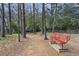 Relaxing community space with a shaded bench and walking path at 4282 Roswell Ne Rd # G2, Atlanta, GA 30342